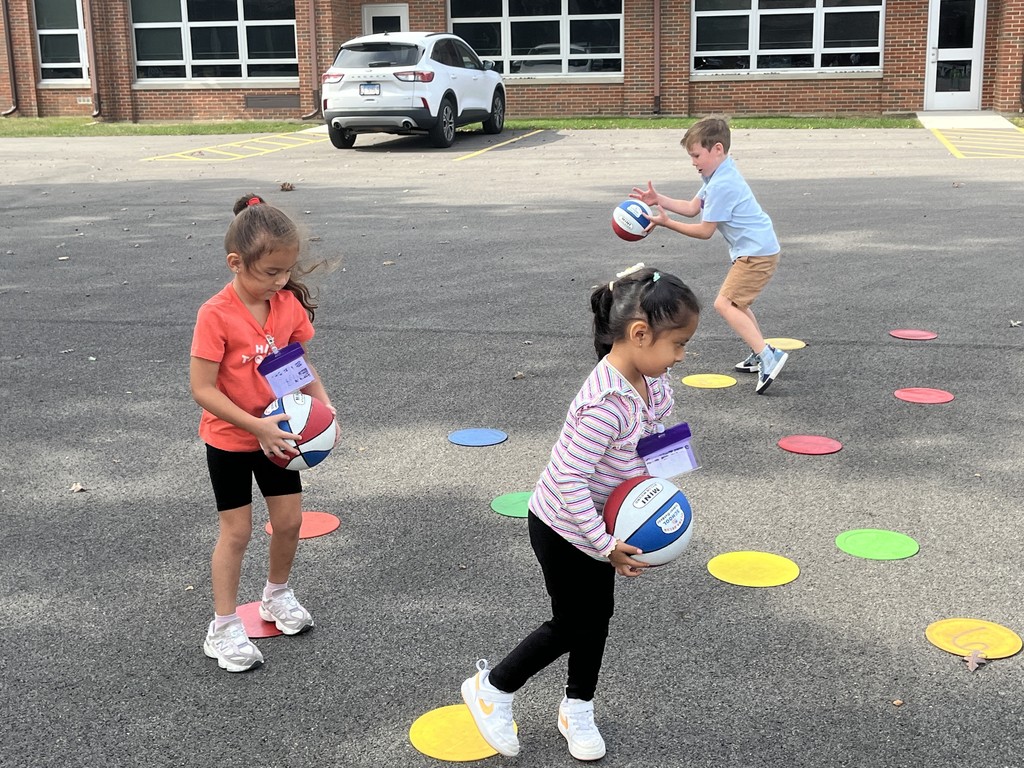 Basketball stations at outdoor P.E. at Woodland Primary