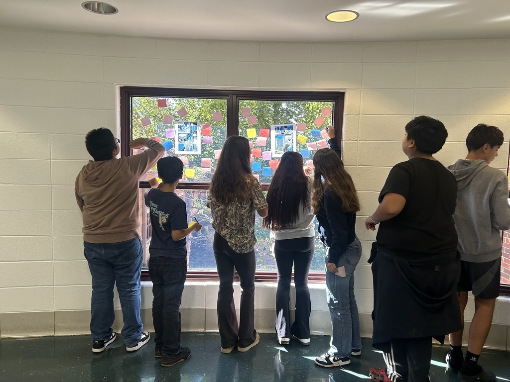 WMS English Language Arts students are observing images from a graphic novel and taking note of examples of foreshadowing.