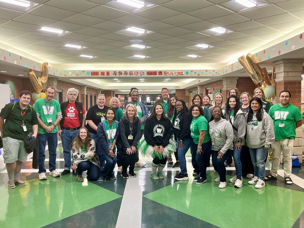 WMS Staff dressed in Green and White to show Woodland pride during Red Ribbon Week