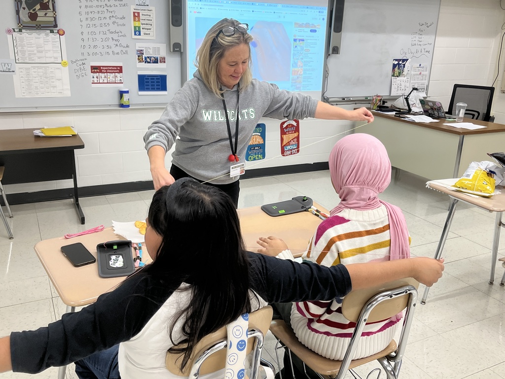 Voice and Vibe Club at WMS making friendship bracelets 