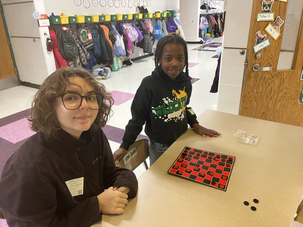 Warren High School Mentors working with Elementary students