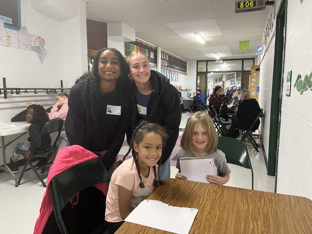 Warren High School Mentors working with Elementary students