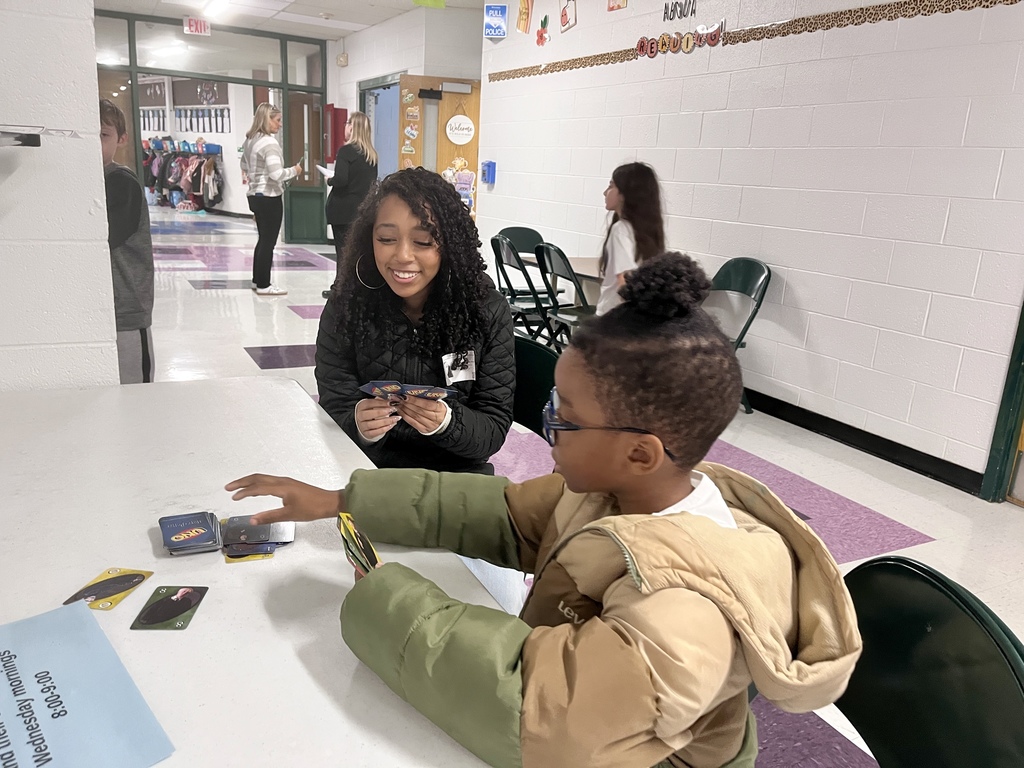 Warren High School Mentors working with Elementary students