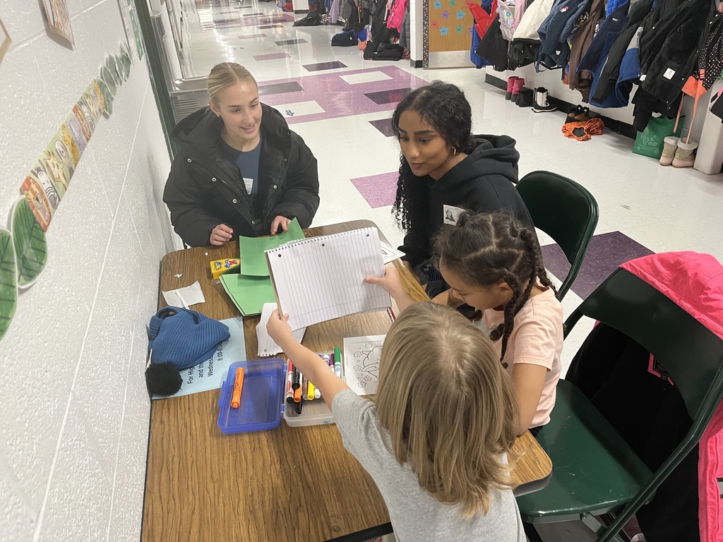 Warren High School Mentors working with Elementary students