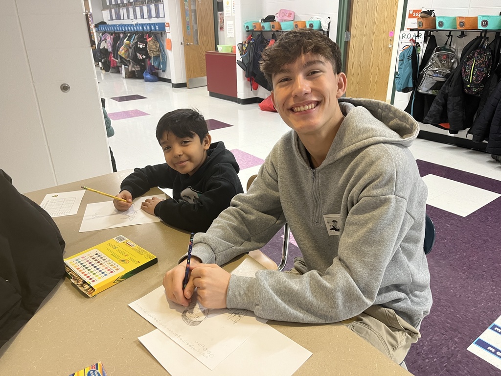 Warren High School Mentors working with Elementary students