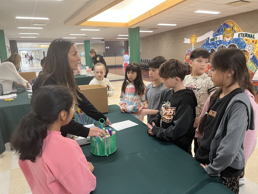4th and 5th grade PBIS Student Leaders pack donations to Lurie Children's Hospital