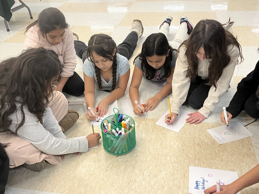 4th and 5th grade PBIS Student Leaders pack donations to Lurie Children's Hospital