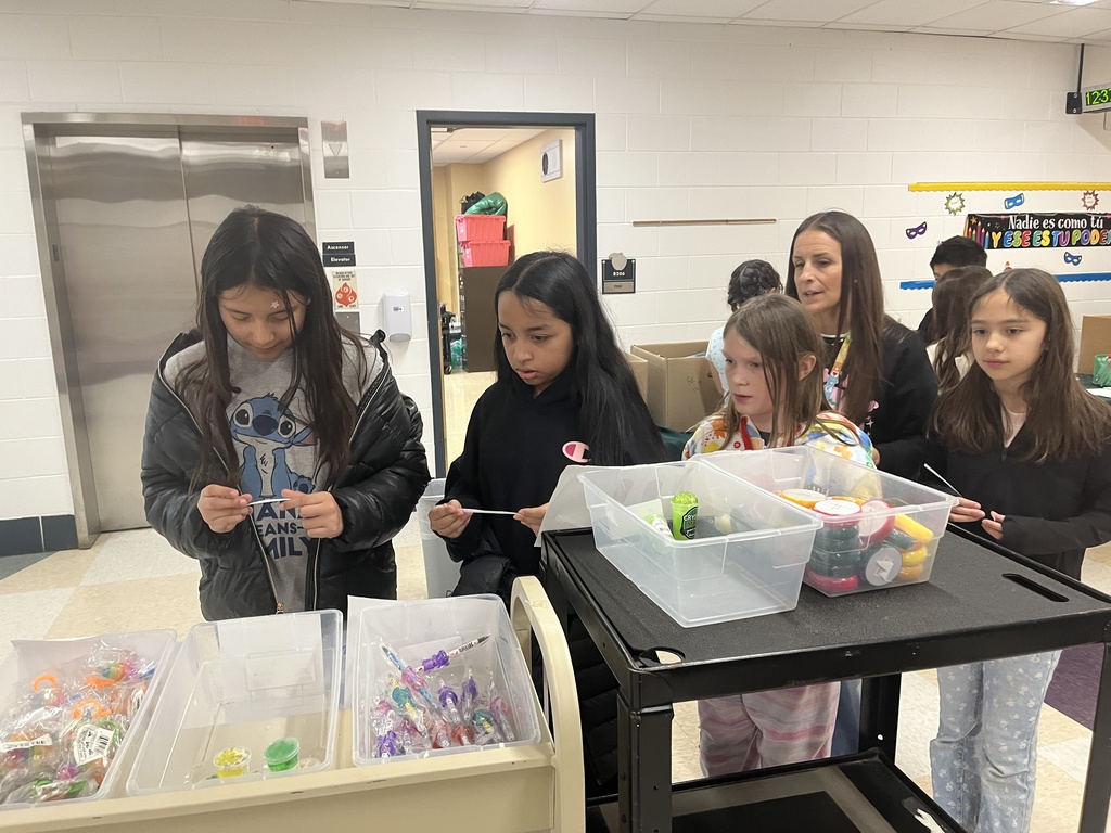4th and 5th grade PBIS Student Leaders pack donations to Lurie Children's Hospital