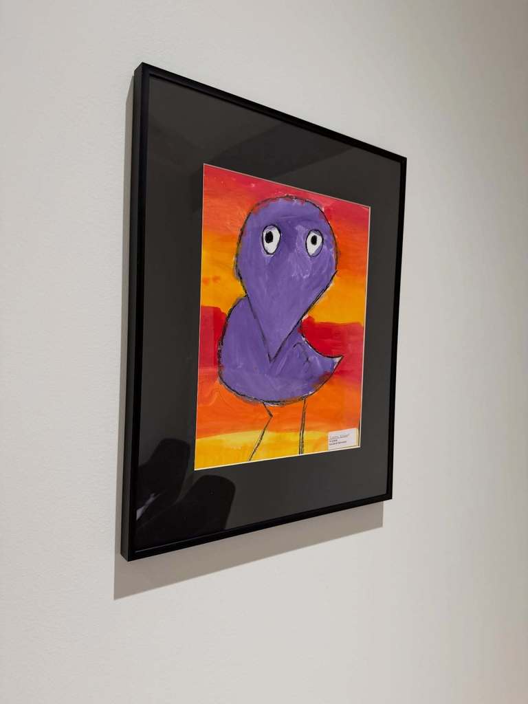 Student Artwork on display at a local car dealership for an art show