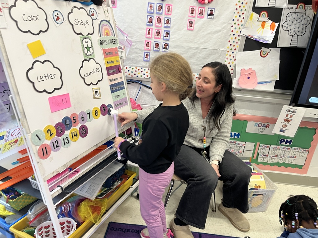 Primary students practice counting on a number line