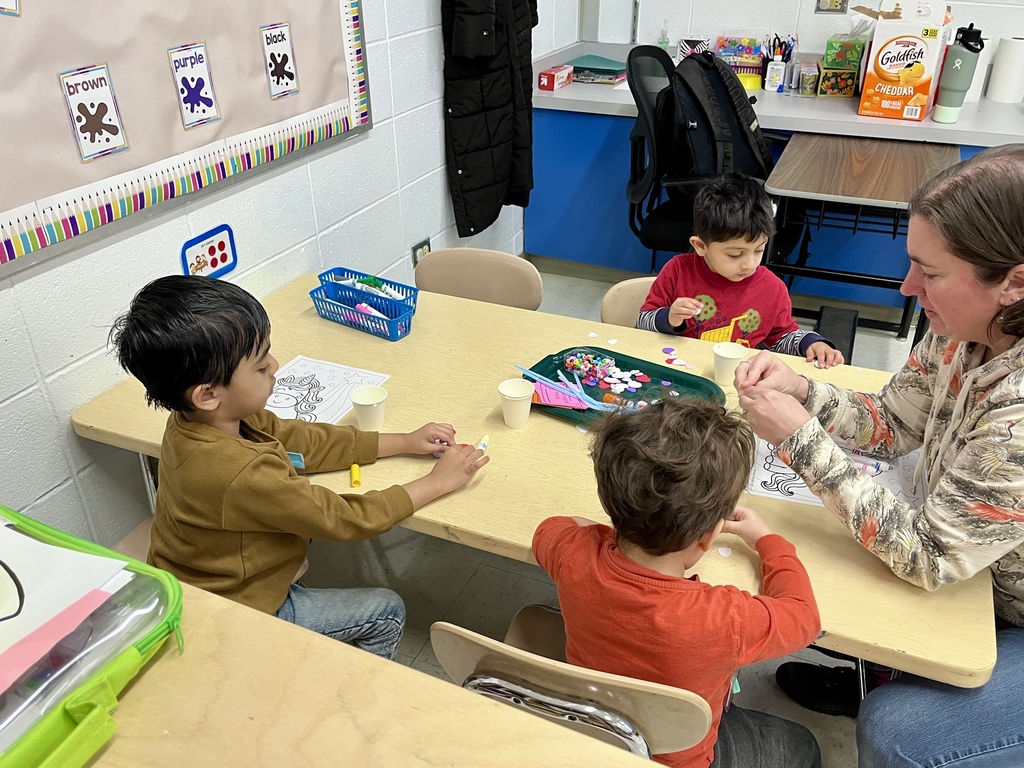 Primary students work in small groups