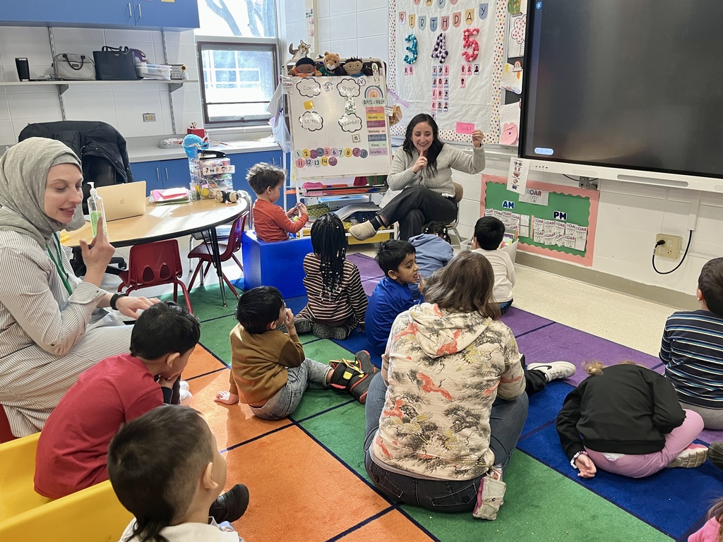 Primary students practice the letter of the day "L"