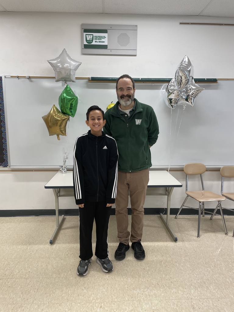 INT Spelling Bee Winner with Principal Sheldon 