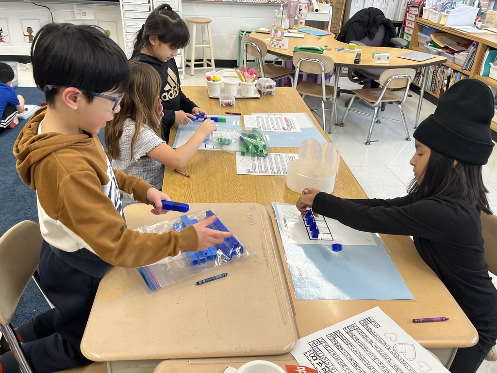 Math lesson on 100th Day of School with Ms. Santos!