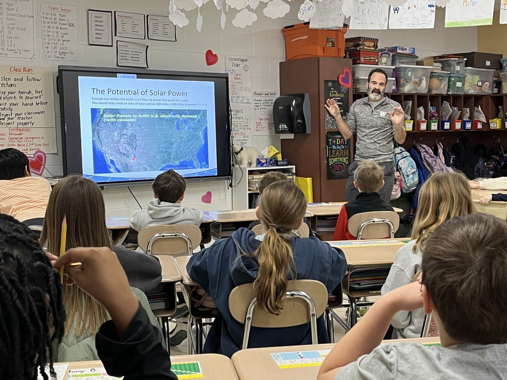 Ms. Weiland's class discusses solar power with Mr. Sheldon at Woodland Intermediate