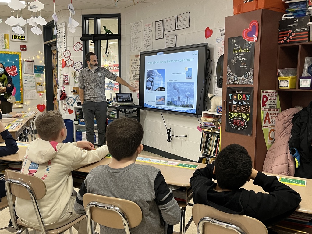 Ms. Weiland's class discusses solar power with Mr. Sheldon at Woodland Intermediate