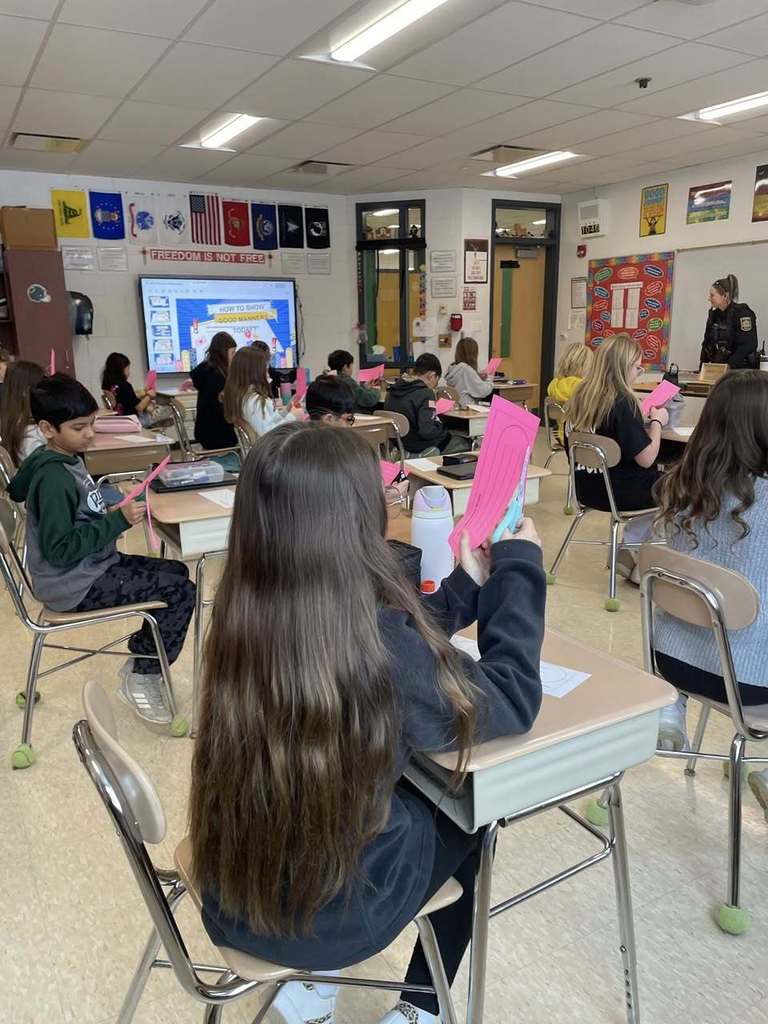 students during health class creating Valentines for members of our community