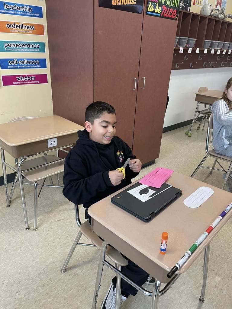 students during health class creating Valentines for members of our community