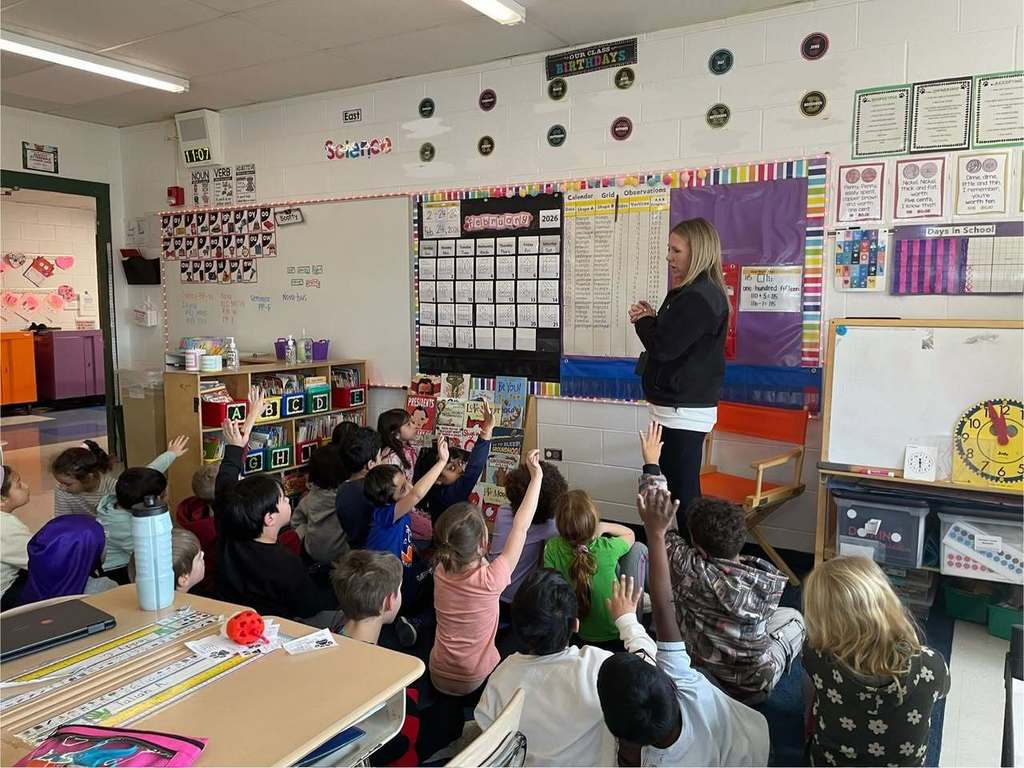 Students working on math problems in class 