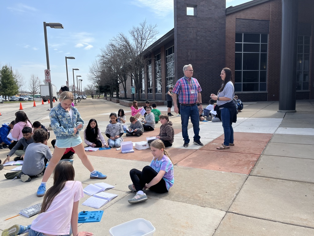 Students work in groups outside on a project to get the motor to run using solar energy at Woodland Intermediate, March 2026