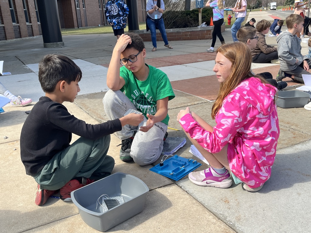 Students work in groups outside on a project to get the motor to run using solar energy at Woodland Intermediate, March 2026