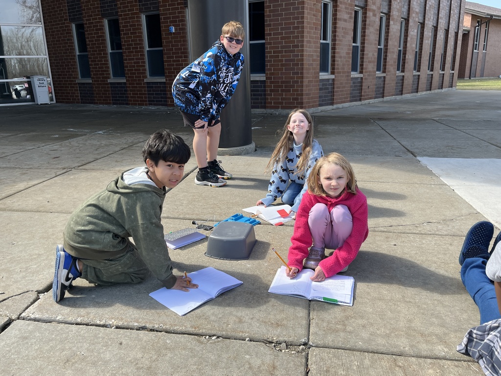 Students work in groups outside on a project to get the motor to run using solar energy at Woodland Intermediate, March 2026