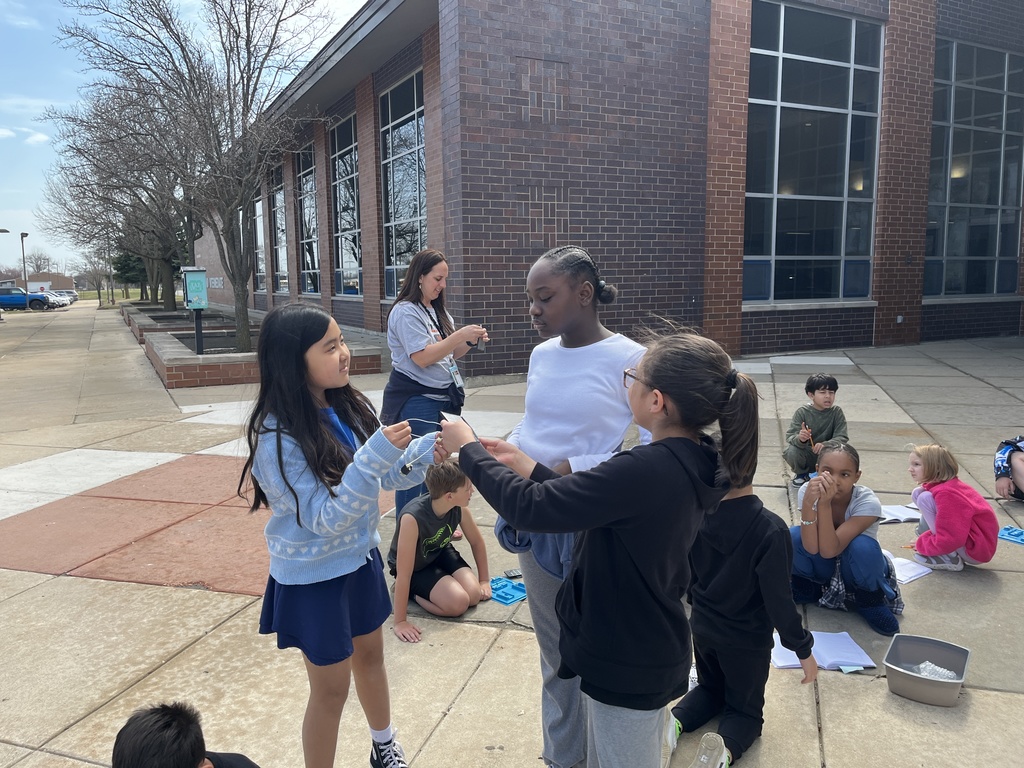 Students work in groups outside on a project to get the motor to run using solar energy at Woodland Intermediate, March 2026