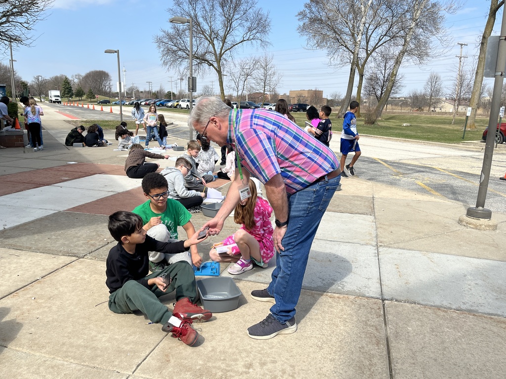 Students work in groups outside on a project to get the motor to run using solar energy at Woodland Intermediate, March 2026