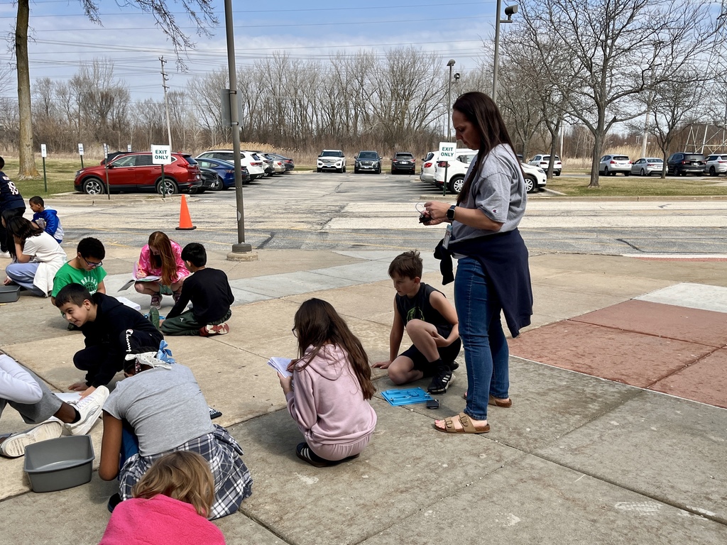 Students work in groups outside on a project to get the motor to run using solar energy at Woodland Intermediate, March 2026