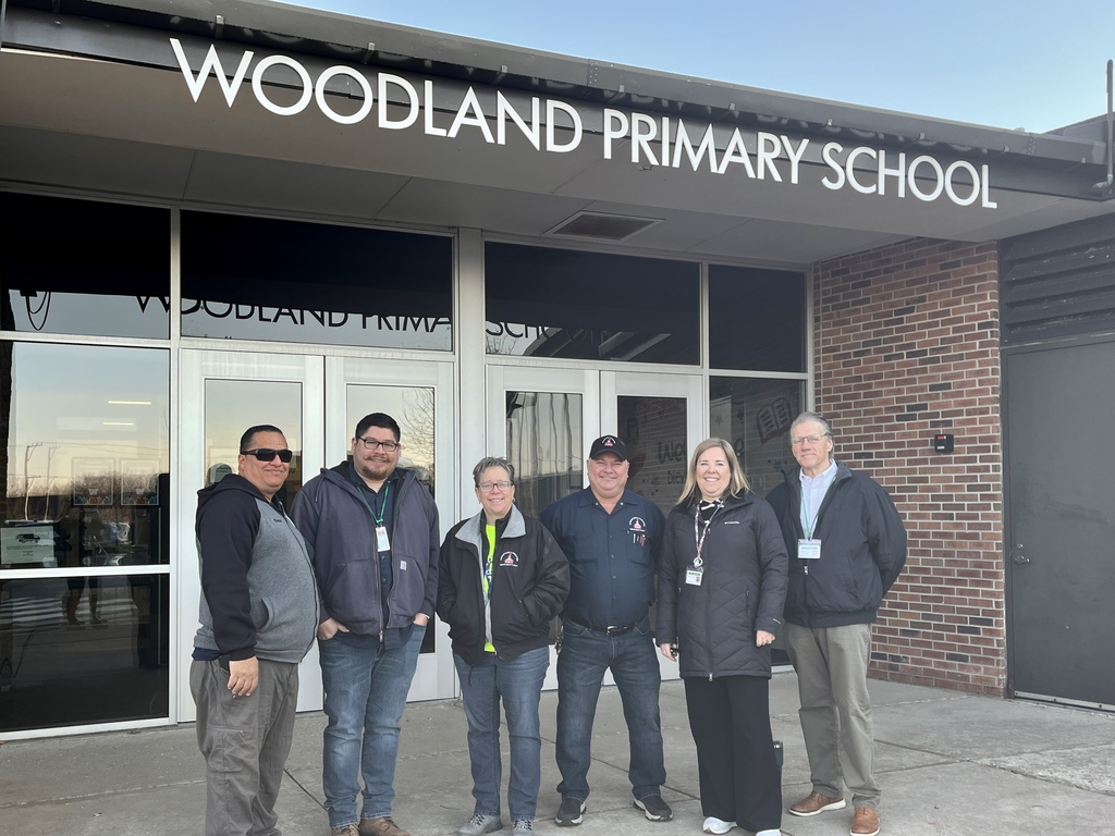 Morning Greeters welcoming students to Woodland Primary April 6, 2026