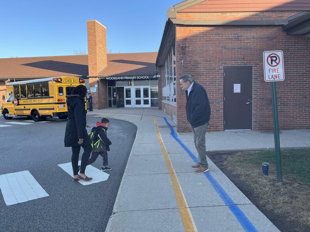 Morning Greeters welcoming students to Woodland Primary April 6, 2026