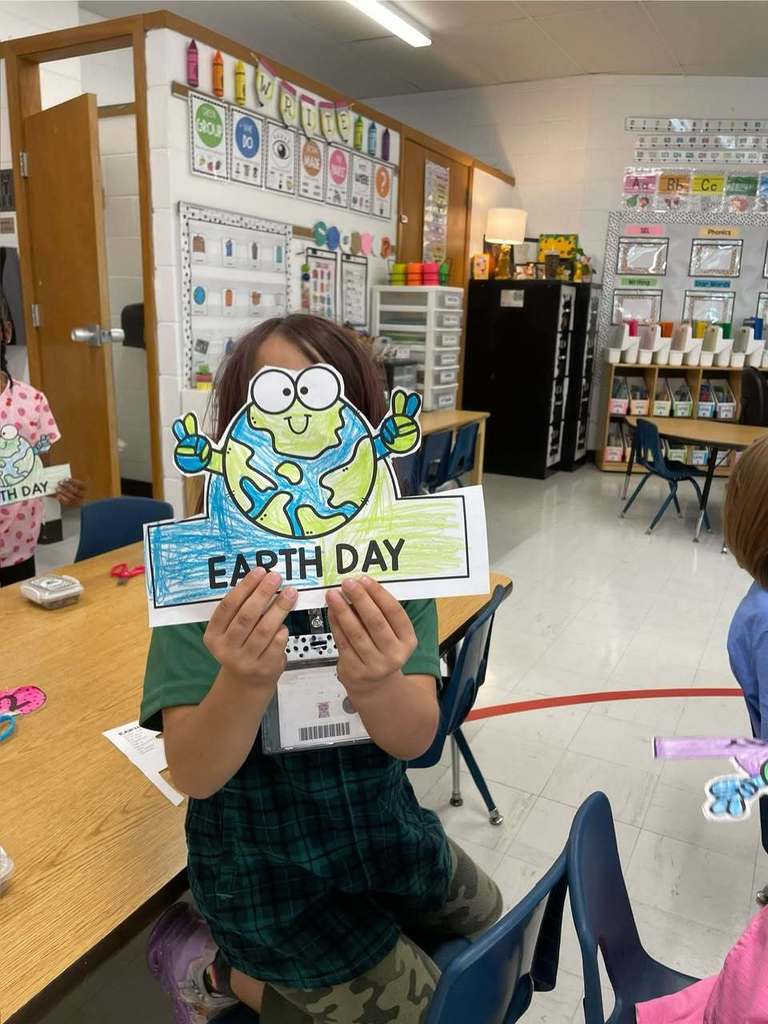 student with earth day project 