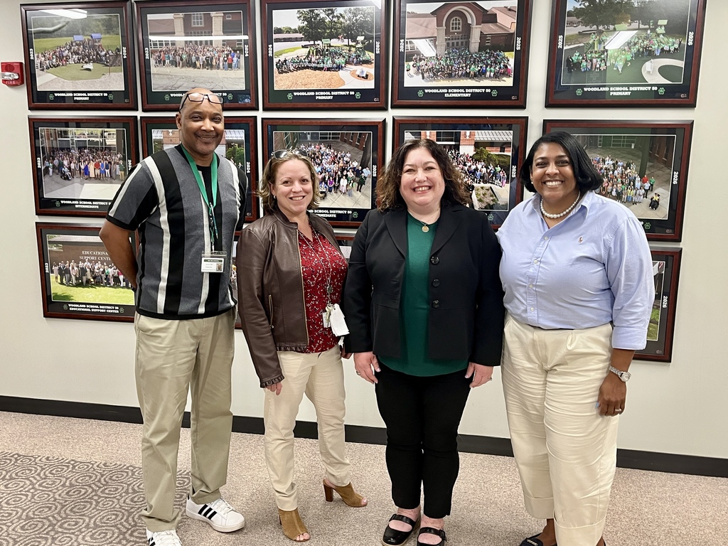 Four Administrators from Woodland Middle School pose for photo  at the Board of Education Meeting April 2026