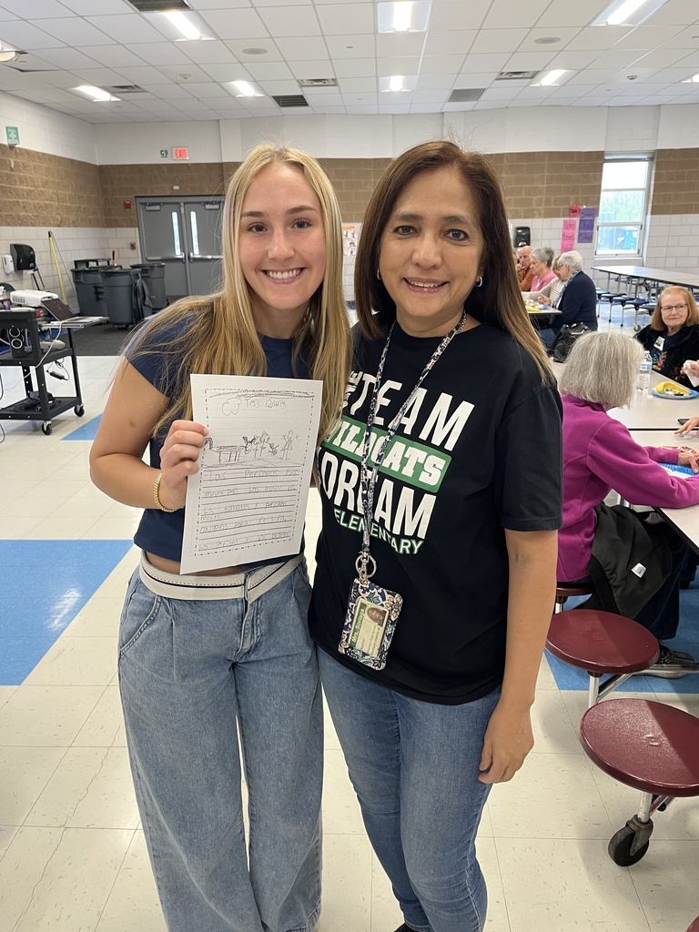 High School volunteer and former student with her Elementary teacher