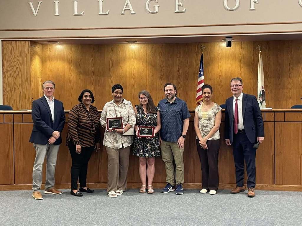 Teacher and Staff Member of the Year at the Gurnee Board Meeting 