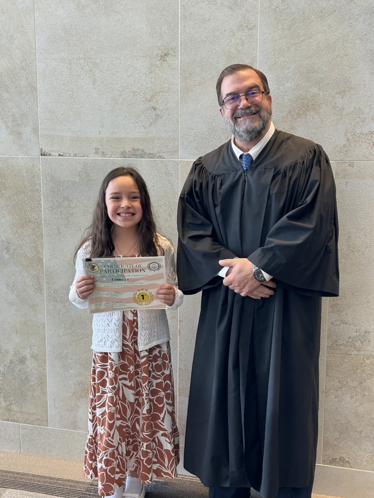 Student artist poses with a Lake County Judge for Law Day May 2026