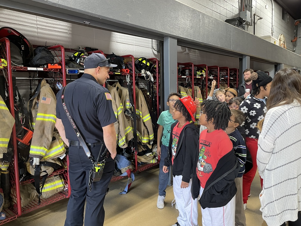 Field trip to the Gurnee Fire Department - students check out the gear lockers