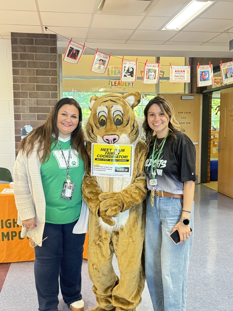 Family Coordinators pose with Wiley the Wildcat