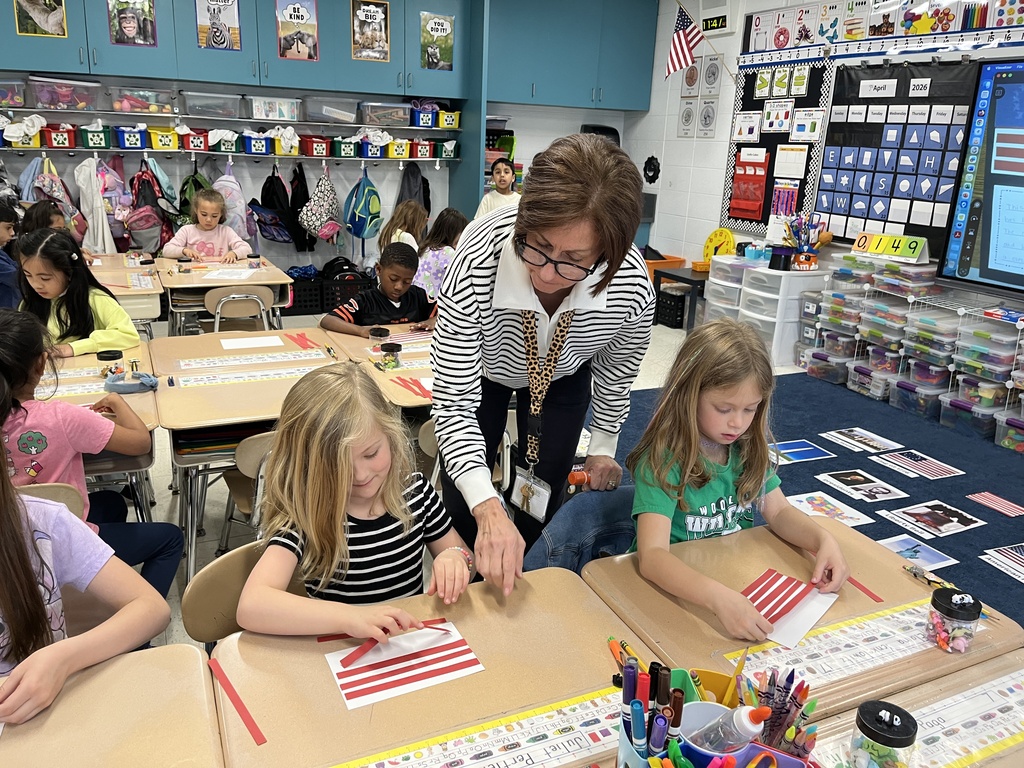 Two students in Mrs. Hansen's Class make American Flags
