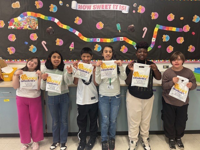 WMS partnered with Honey Orthodontics to create bags for patients and build job and independence skills for the students