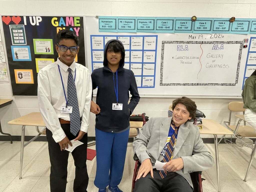 Students giving presentations to their classmates on famous figures in history