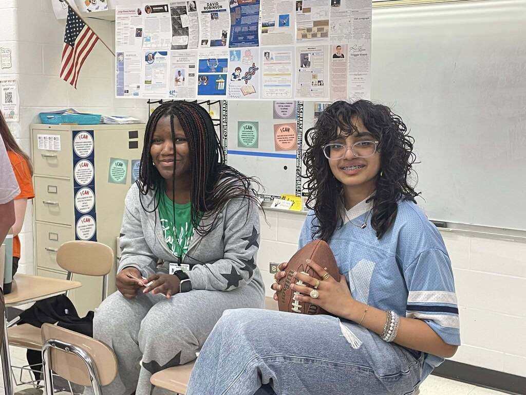 Students giving presentations to their classmates on famous figures in history