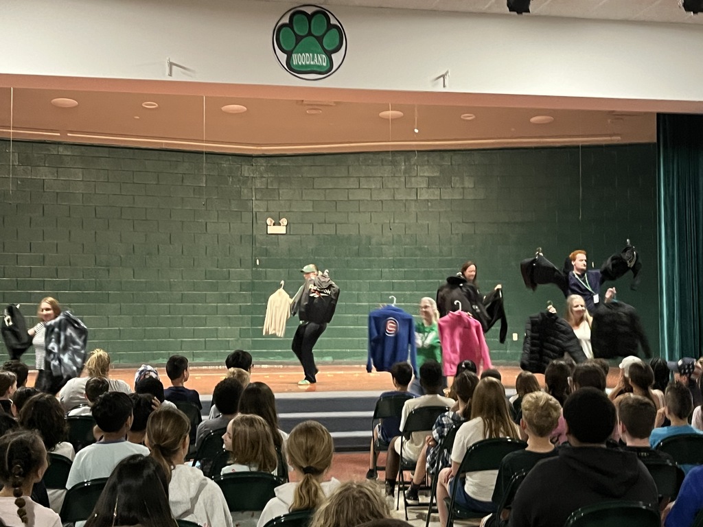 Staff "Fashion" Show with items from the Lost & Found