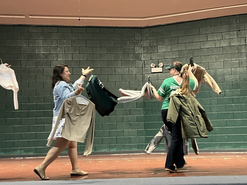 Staff "Fashion" Show with items from the Lost & Found