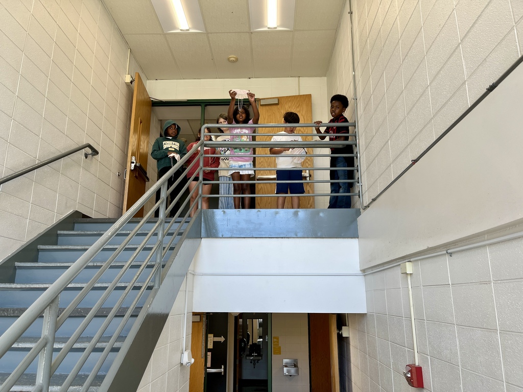 student tests the parachute she made