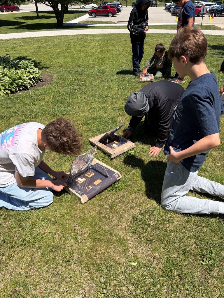 creating solar ovens to cook s'mores June 2026