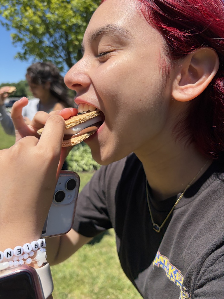 Student enjoys a s'more