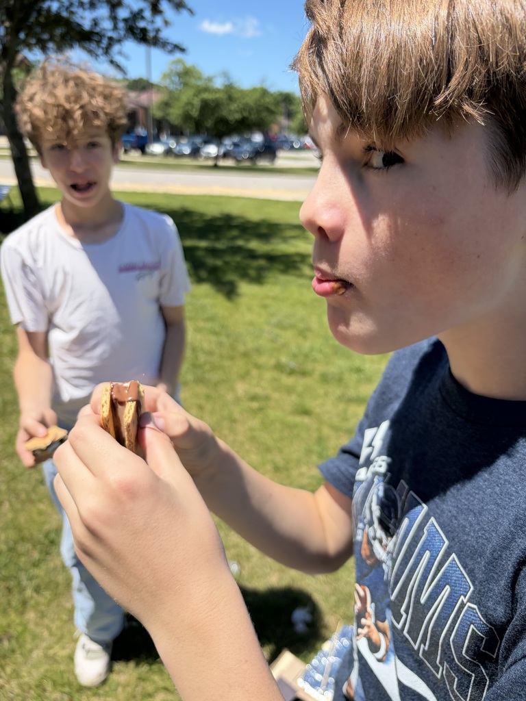 Student enjoys a s'more