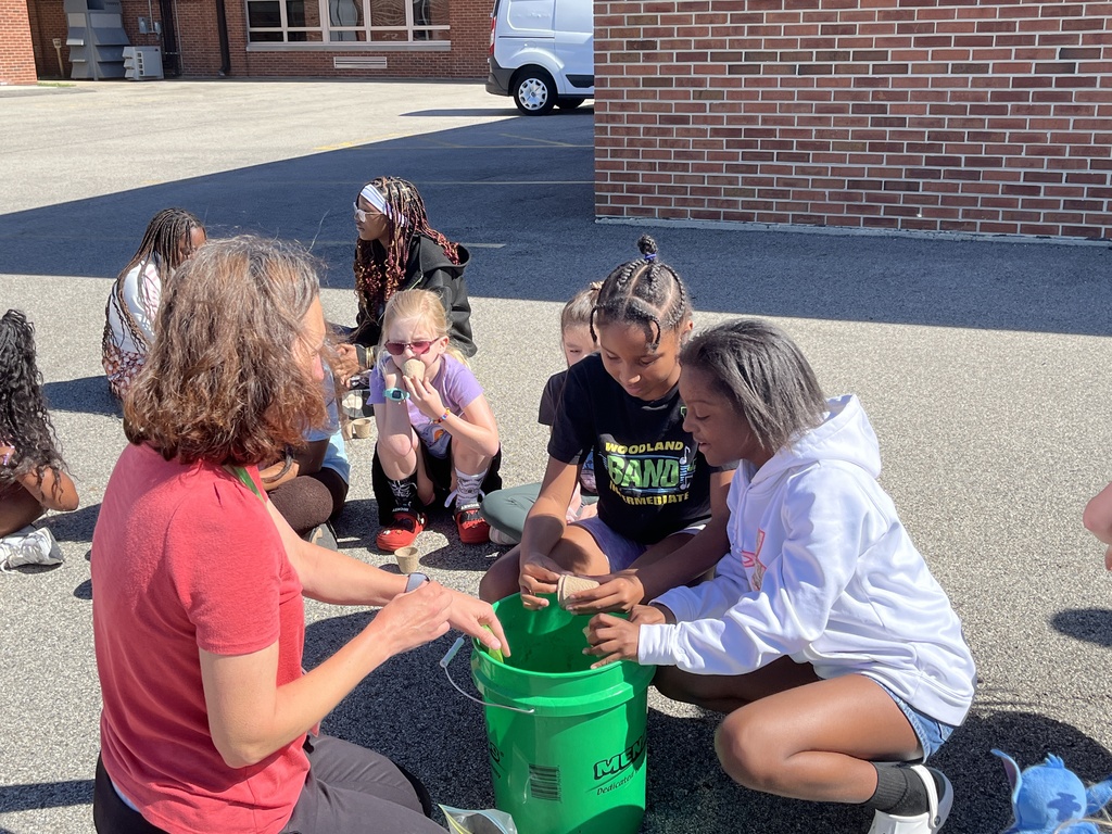Adventures in Agriculture - planting seeds outside at summer school
