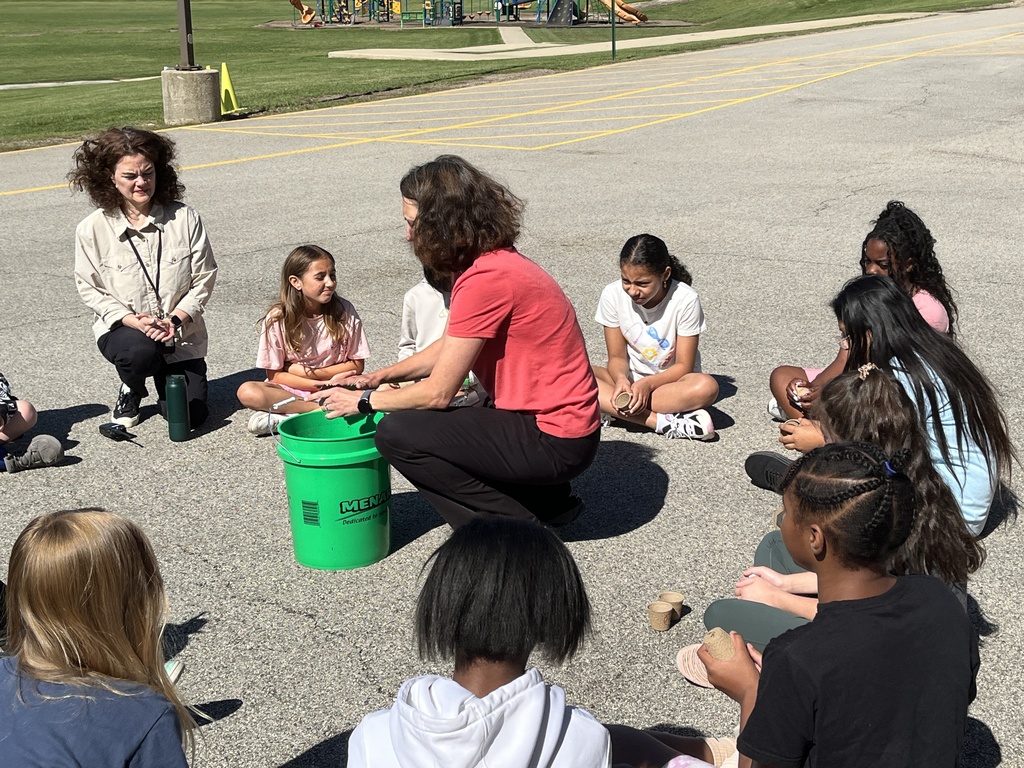 Adventures in Agriculture - planting seeds outside at summer school